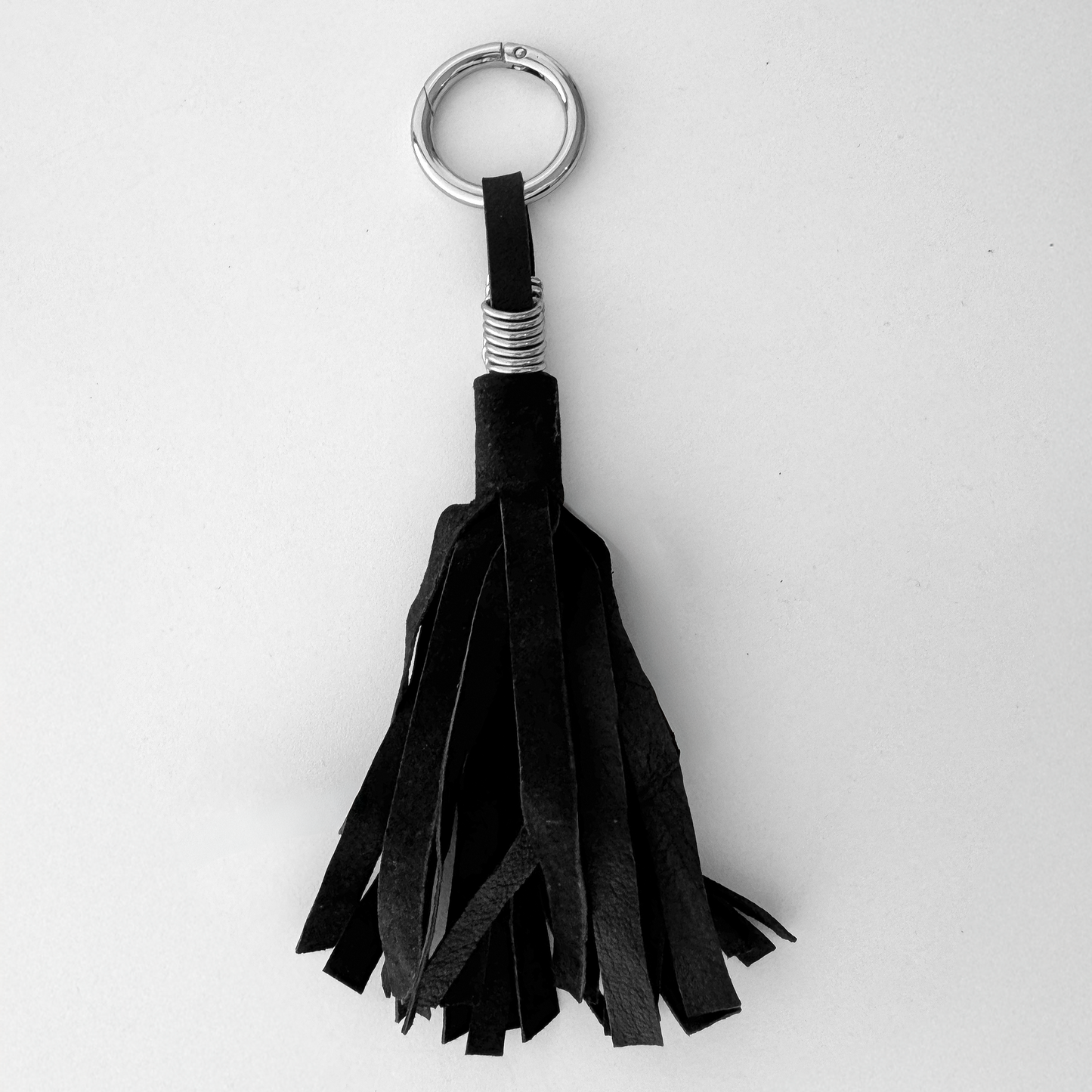 THE TASSLE CHARM