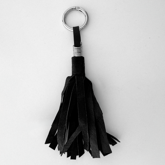 THE TASSLE CHARM