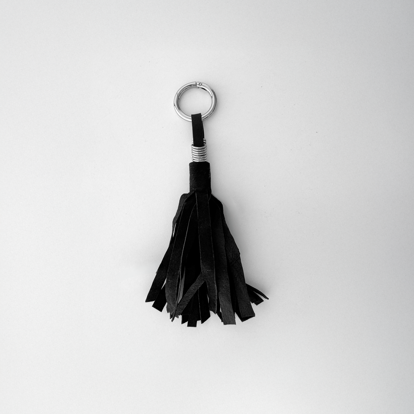 THE TASSLE CHARM