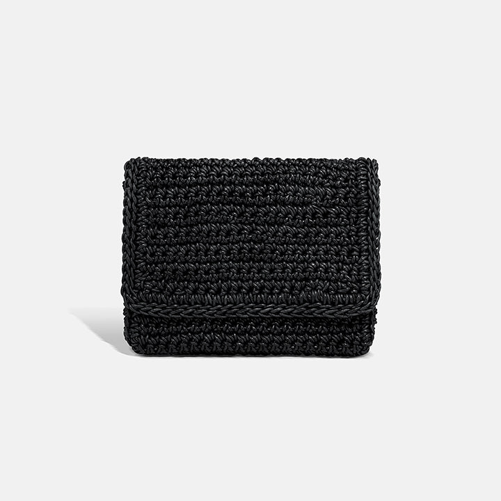 THE CLUTCH BAG in black — hand-crocheted leather evening clutch by PROVE'M WRONG, front view