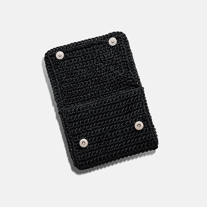 THE CLUTCH BAG in black — back view of the hand-crocheted leather clutch | PROVE'M WRONG