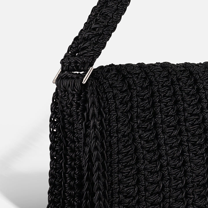 THE BAGUETTE BAG — detail of hand-crocheted leather texture