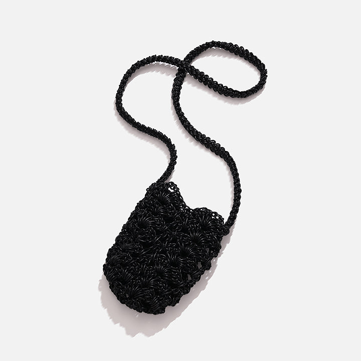 THE LACE BAG in black — detail of openwork lace stitch crochet leather
