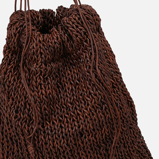 THE POUCH BAG in brown — detail of knitted leather texture and drawstring | PROVE'M WRONG