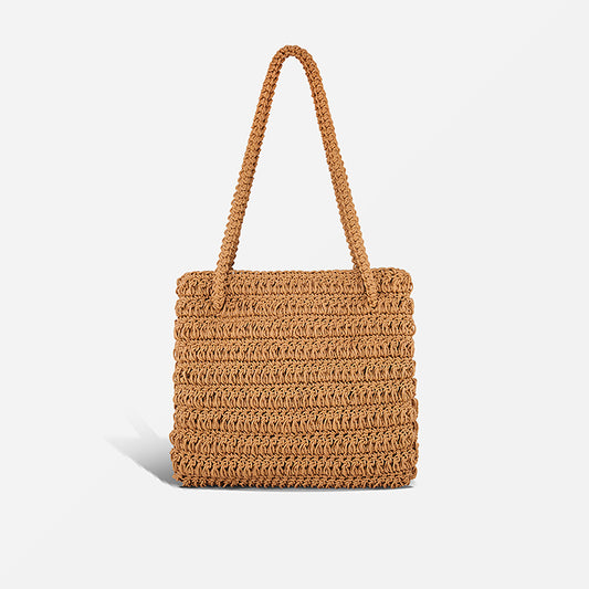 THE STAPLE BAG in tan — hand-crocheted leather shoulder tote by PROVE'M WRONG, front view