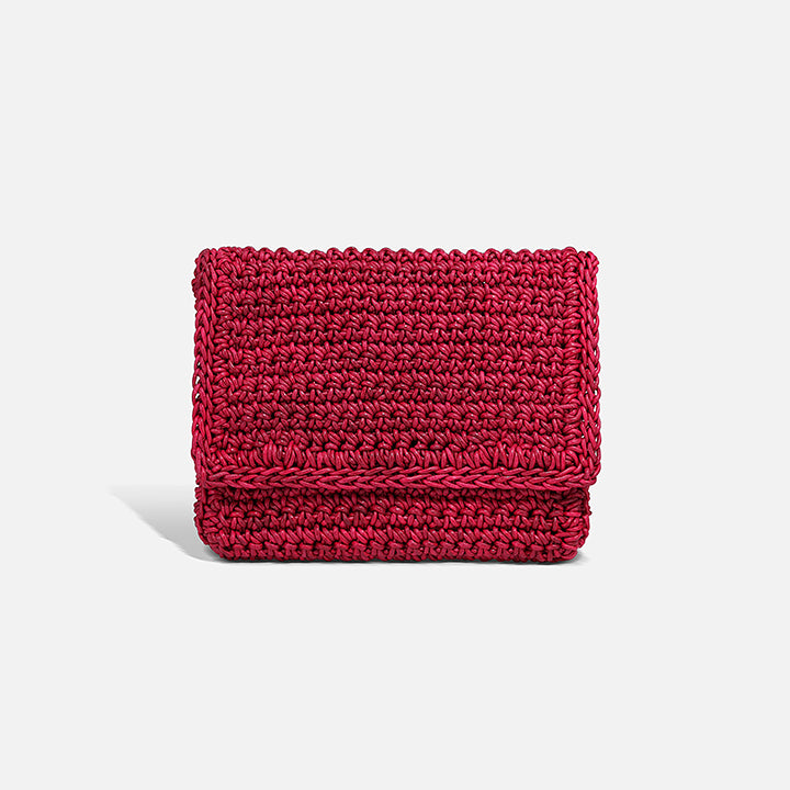 THE CLUTCH BAG in cherry red — hand-crocheted leather evening clutch by PROVE'M WRONG, front view