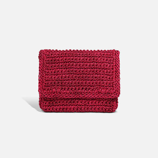 THE CLUTCH BAG in cherry red — hand-crocheted leather evening clutch by PROVE'M WRONG, front view