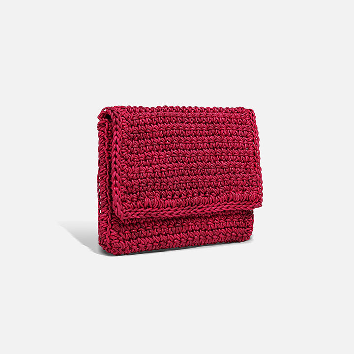THE CLUTCH BAG in cherry red — back view of the hand-crocheted leather clutch | PROVE'M WRONG