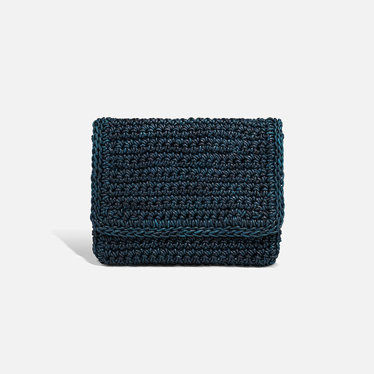 THE CLUTCH BAG in petrol — hand-crocheted leather evening clutch by PROVE'M WRONG, front view