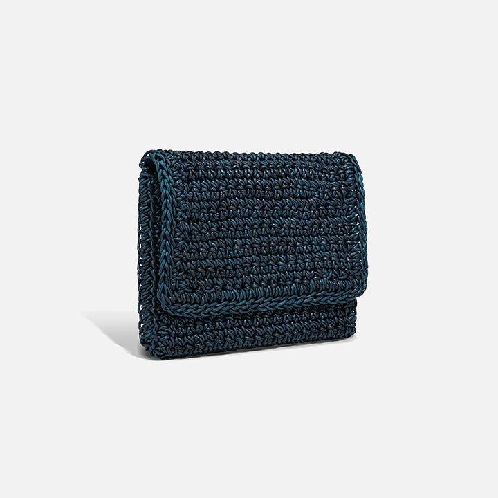THE CLUTCH BAG in petrol — back view of the hand-crocheted leather clutch | PROVE'M WRONG