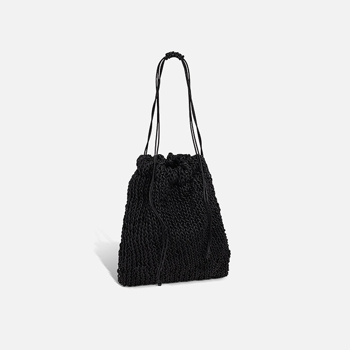 THE POUCH BAG in black — side view of hand-knitted leather pouch | PROVE'M WRONG