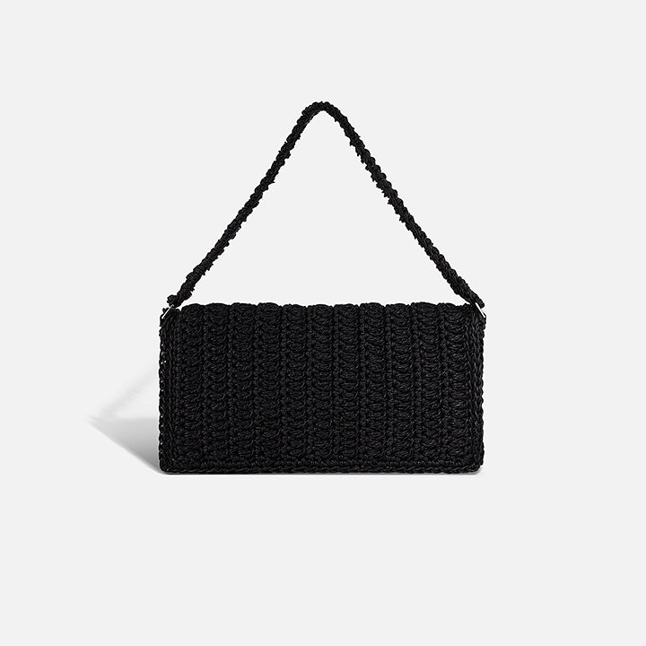 THE BAGUETTE BAG — slim hand-crocheted leather shoulder bag by PROVE'M WRONG, front view