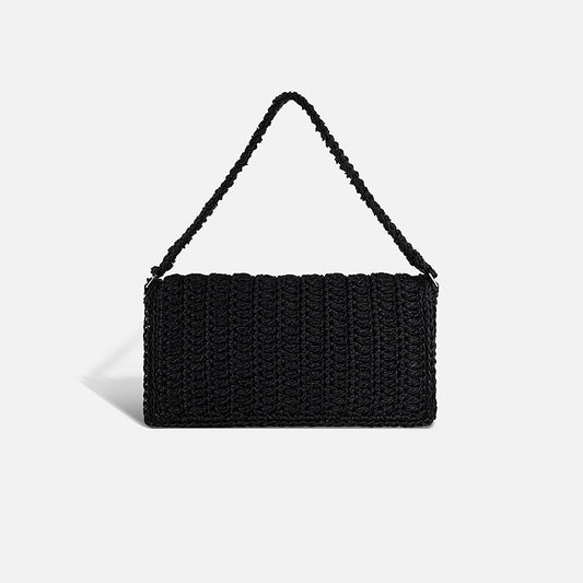 THE BAGUETTE BAG — slim hand-crocheted leather shoulder bag by PROVE'M WRONG, front view