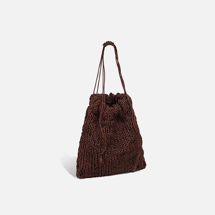 THE POUCH BAG in brown — side view of hand-knitted leather pouch | PROVE'M WRONG
