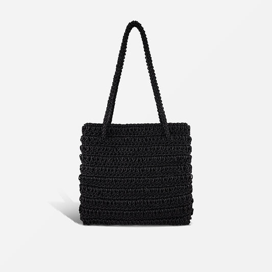 THE STAPLE BAG in black — hand-crocheted leather shoulder tote by PROVE'M WRONG, front view