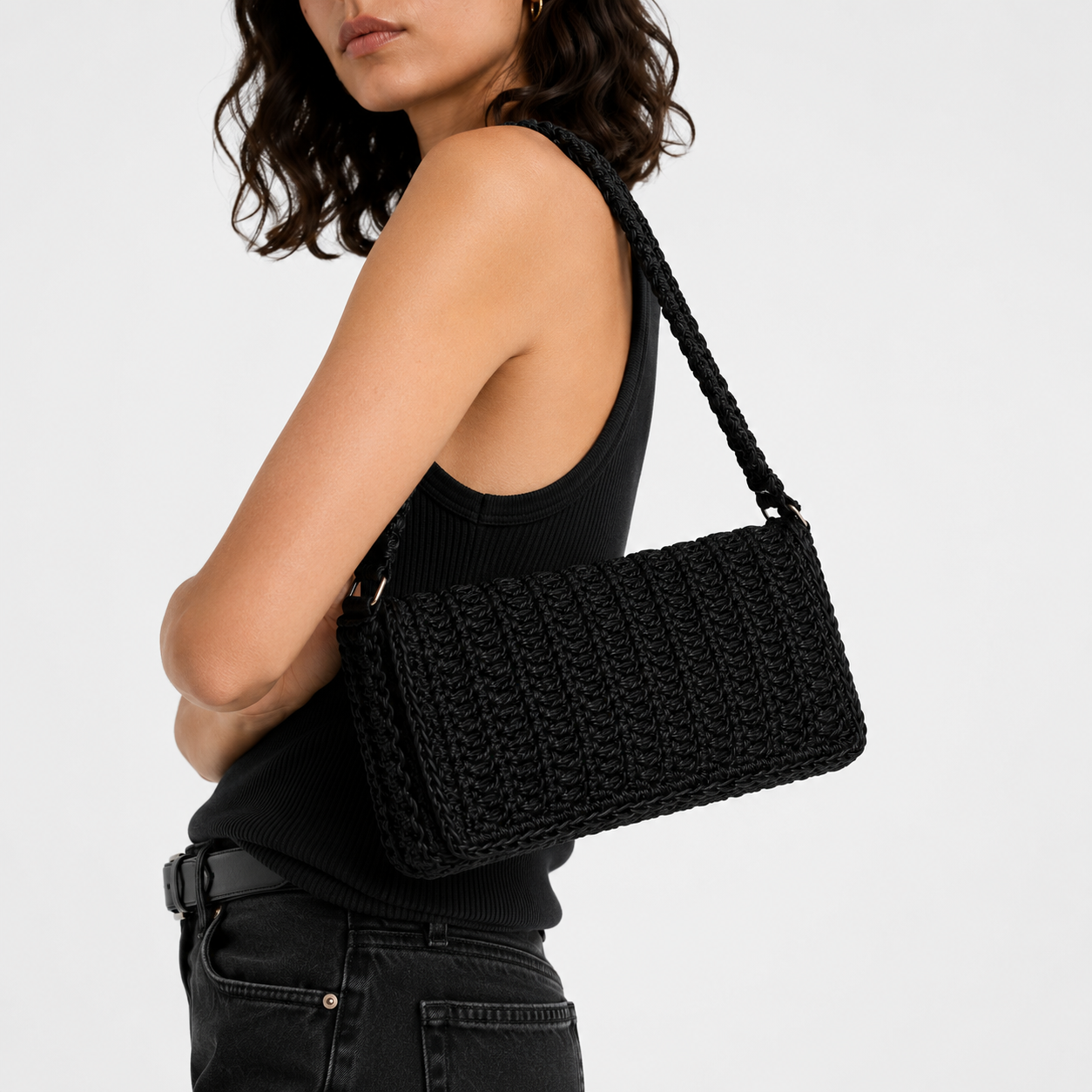Close-up of THE BAGUETTE BAG, hand-crocheted leather texture in detail | PROVE'M WRONG
